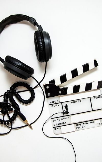 headphones and clapperboard