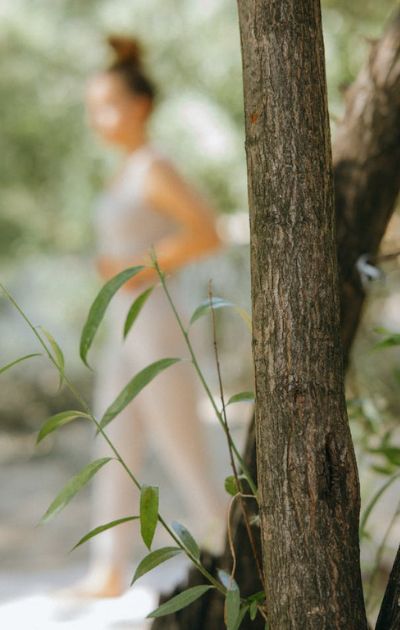 woman doing yoga in the garden